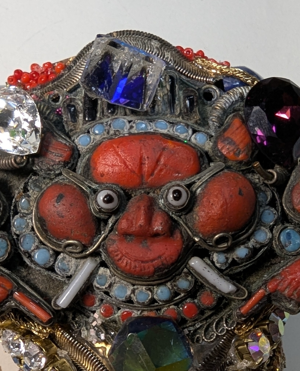 Wendy Gell cuff Garuda face with lapis and rose quartz rhinestone chain Swarovsk